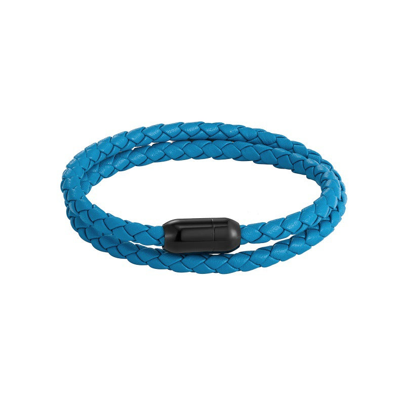 Blue braided leather bracelet with a black magnetic clasp on a white background