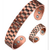 Antique copper open cuff bracelet with a woven bamboo texture and visible magnets on the ends