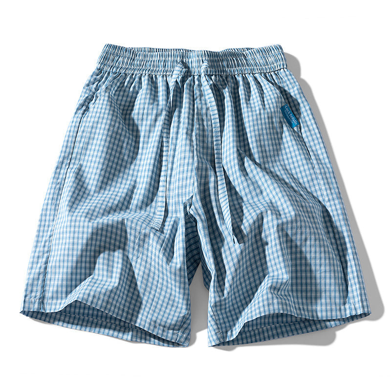 Light blue plaid cotton shorts with elastic waistband