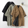 Three quilted cotton coats in black, green, and brown laid flat on a white surface