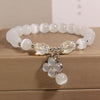 Cat's Eye Charm Bracelet with Flower, Bear and Swan