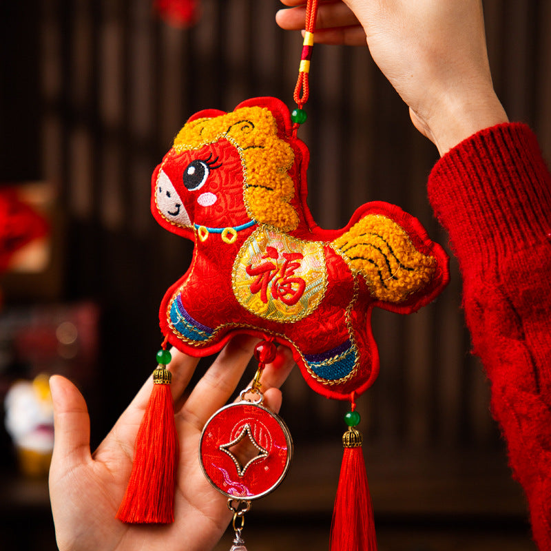 Red plush embroidered horse ornament with gold Fu character and hanging coin charm