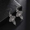 Hollow Lotus Flower Stainless Steel Enlightenment Metal Drop Earrings