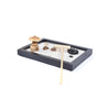 Small rectangular zen garden tray with white sand, stones, and a wooden rake tool