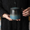 Ceramic Tea Cup with Infuser and Wooden Handle