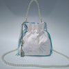 Embroidered Canvas Crossbody Bag with Tassels