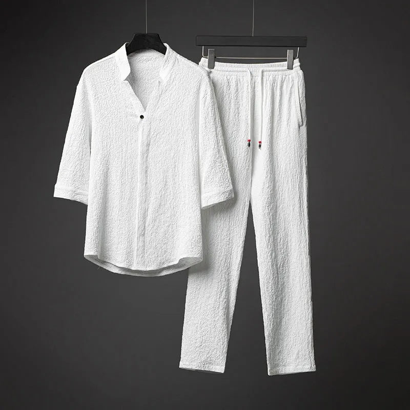 White textured two-piece men's meditation outfit with half-sleeve top and long pants