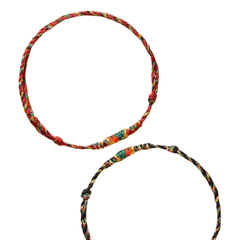Two hand-braided rope bracelets with koi fish charms on a white background