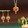Gold plated sterling silver jewelry set with red lotus enamel pendant, ring and earrings