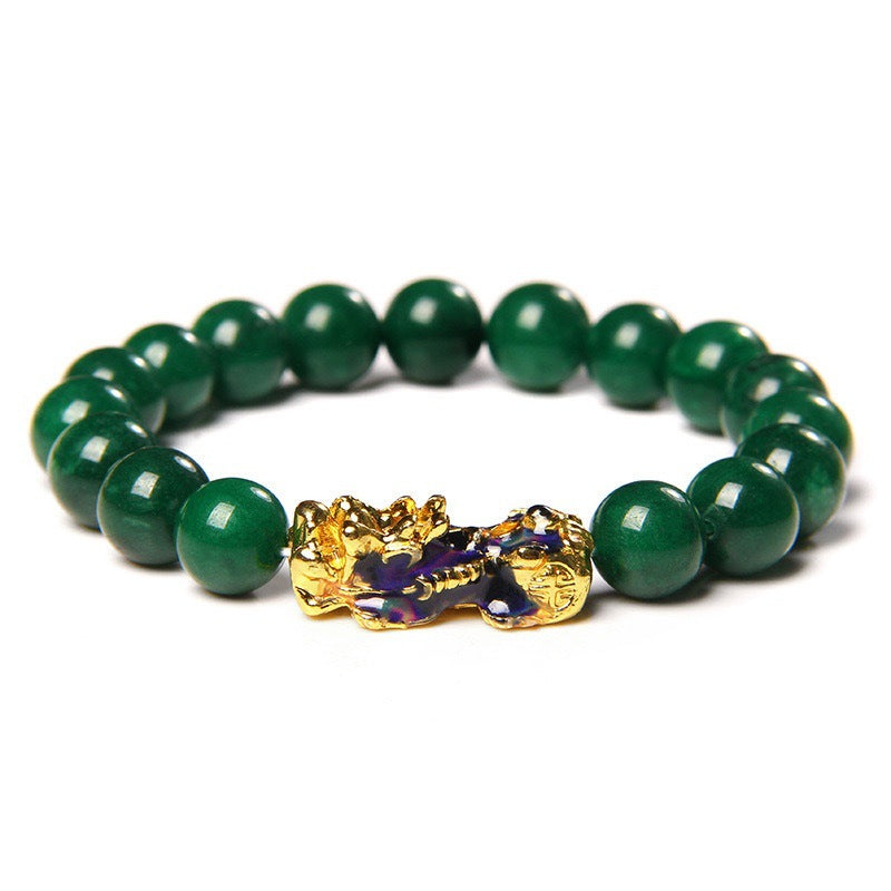 Green agate bead bracelet with gold-tone Pixiu charm on white background