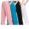 Four pairs of loose fitting cotton linen pants in pink, blue, black and white