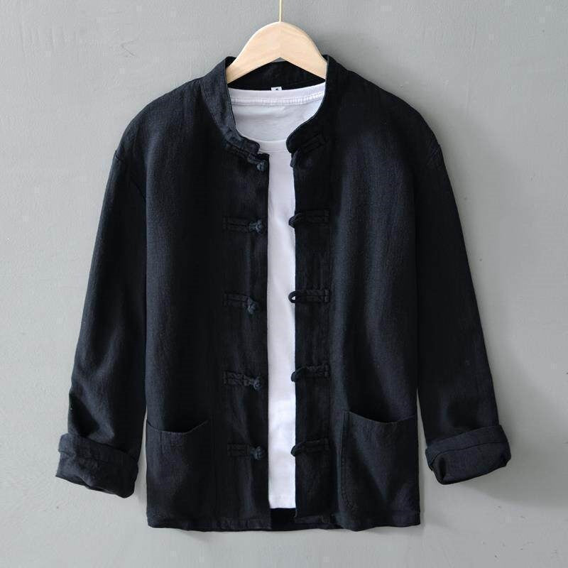 Black long-sleeve men's shirt with traditional knot buttons hanging on a wooden hanger