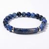 Blue sodalite beaded bracelet with a central bridge stone charm