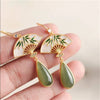 Fan Pattern Luck Drop Earrings with Bamboo Leaf Design