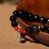 Black Obsidian and Cinnabar Lotus Pod Bracelet