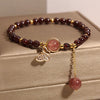 Garnet Butterfly Bracelet with Gold-Tone Charm