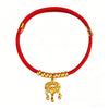 Red cord pet collar with gold-tone lock charm on red background