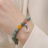 Jade Bead Bracelet with Lotus, Pumpkin or Peace Buckle Charm