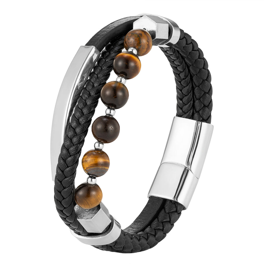 Close up of a black braided leather bracelet with yellow brown tiger eye beads and silver metal clasps