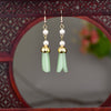 Long Drop Earrings with Floral Charm and Faux Pearl