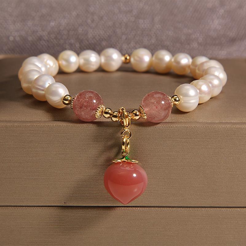 Freshwater Pearl Bracelet with Peach or Persimmon Charm
