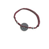 Burgundy red braided cord bracelet with a round silver coin charm and two small beads