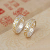Silver-tone adjustable copper ring with gold-tone floral engraving
