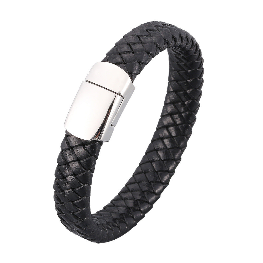 Close up of a black braided leather bracelet with a silver tone metal clasp