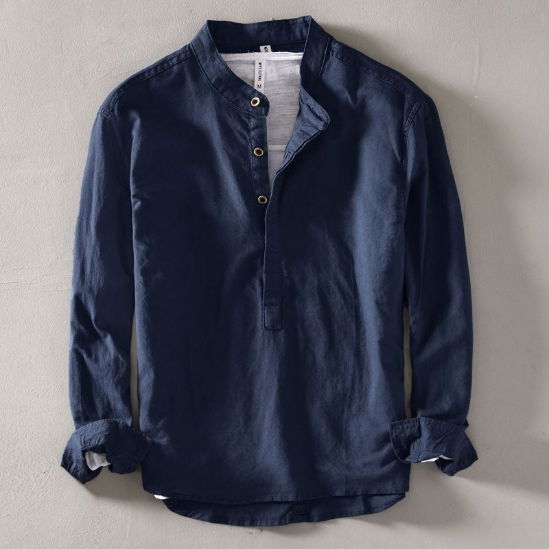 Navy blue men's long sleeve shirt with a stand collar and half button placket