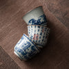 Blue and White Porcelain Teacup with Calligraphy and Landscape