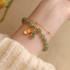 Interlocking Peace Buckle Bracelet, Faux Jade Beads