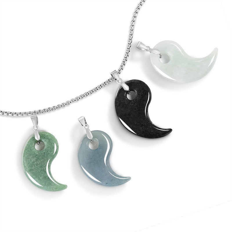 Four color variations of a curved jade pendant hanging from a silver chain