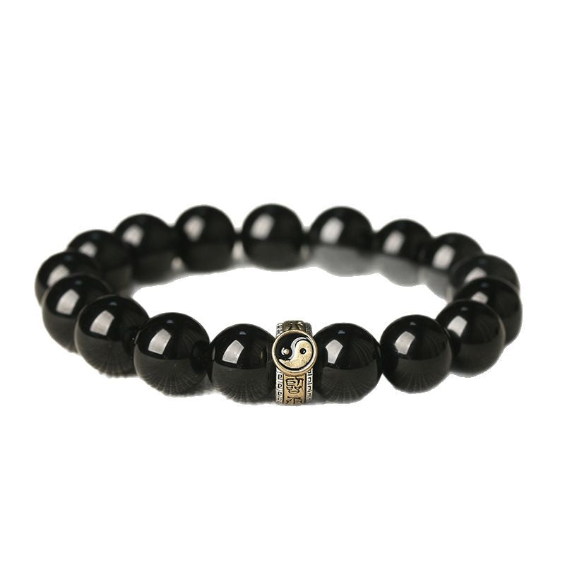 Black obsidian beaded bracelet with gold-tone yin yang charm