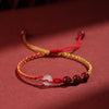Red and Yellow Braided Cord Bracelet
