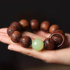 Engraved Tiger Wood Bracelet with Green Bead