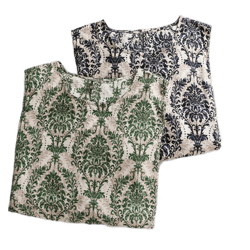 Sleeveless midi dress with green botanical print and pockets