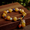 Golden Silk Jade Gourd Charm Bracelet