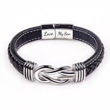 Black braided leather bracelet with silver infinity knot clasp
