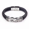 Black braided leather bracelet with silver infinity knot clasp