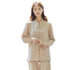Woman wearing beige cotton linen meditation outfit holding prayer beads