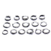 Collection of small silver-tone stainless steel hoop earrings with various textures on a white background