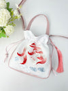 White silk satin bucket bag with red koi fish embroidery and pink tassel