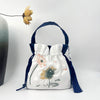 Embroidered Drawstring Bucket Bag with Tassel, Floral and Animal Motifs