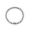 Round blue moonstone beads on a stretch cord with a central gold Pixiu charm