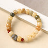 Weathered Bodhi Seed Bracelet with Tibetan Charm