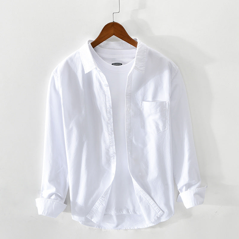 White men's cotton long sleeve button down shirt on a hanger