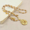 Long Faux Tiger Eye Necklace with Gold-Tone Compass Pendant