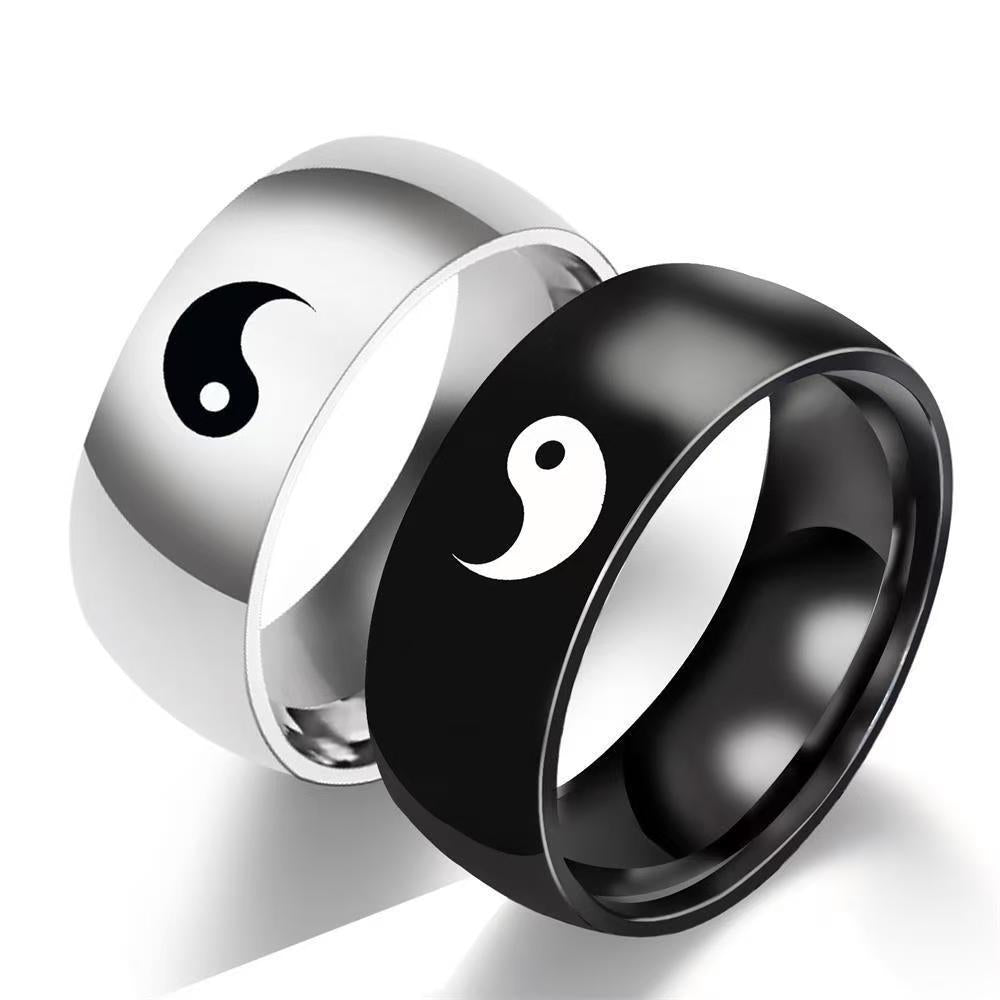 Silver and black titanium steel rings with Yin Yang symbols