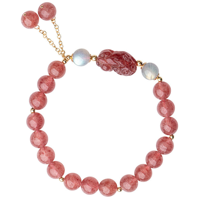 Pink strawberry quartz beaded bracelet with a central red pixiu charm and gold chain tassel