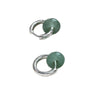 Close-up of a silver hoop earring with a round green stone pendant on an ear